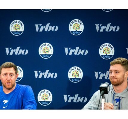 Liam Coen addressing the media as the new Jacksonville Jaguars head coach